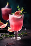 Pink cocktail with fig, thyme and ice in glass