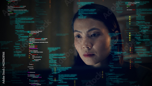 Asian woman working on a computer with binary code protection against cybersecurity threats. Increase the security of data access Programmers who develop software or applications using AI innovations.