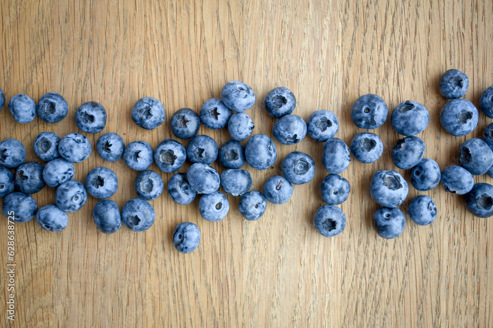 Beautiful blueberry on a wooden background. Quality image for your project Beautiful blueberry on a wooden background. Quality image for your project