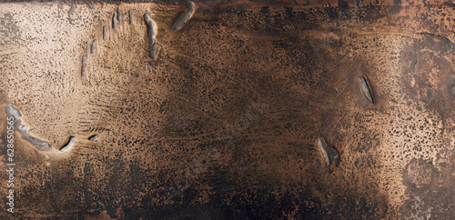 immagine di superficie metallica in bronzo grezzo con imperfezioni, vista dall'alto