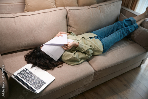 Exhausted freelance lady taking break from work