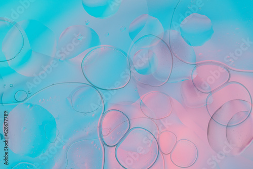 Iridescent colorful abstract background with bubbles, fluid texture pastel tones curvy wavy good vibes