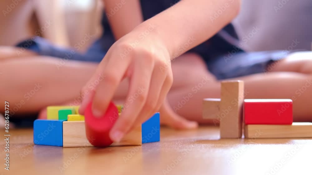 smart child, schoolboy playing with educational toy, wooden geometric figures, blocks in boy's hands, developing brain games, concept childhood, earlier child development, creativity, early training smart child, schoolboy playing with educational toy, wooden geometric figures, blocks in boy's hands, developing brain games, concept childhood, earlier child development, creativity, early training