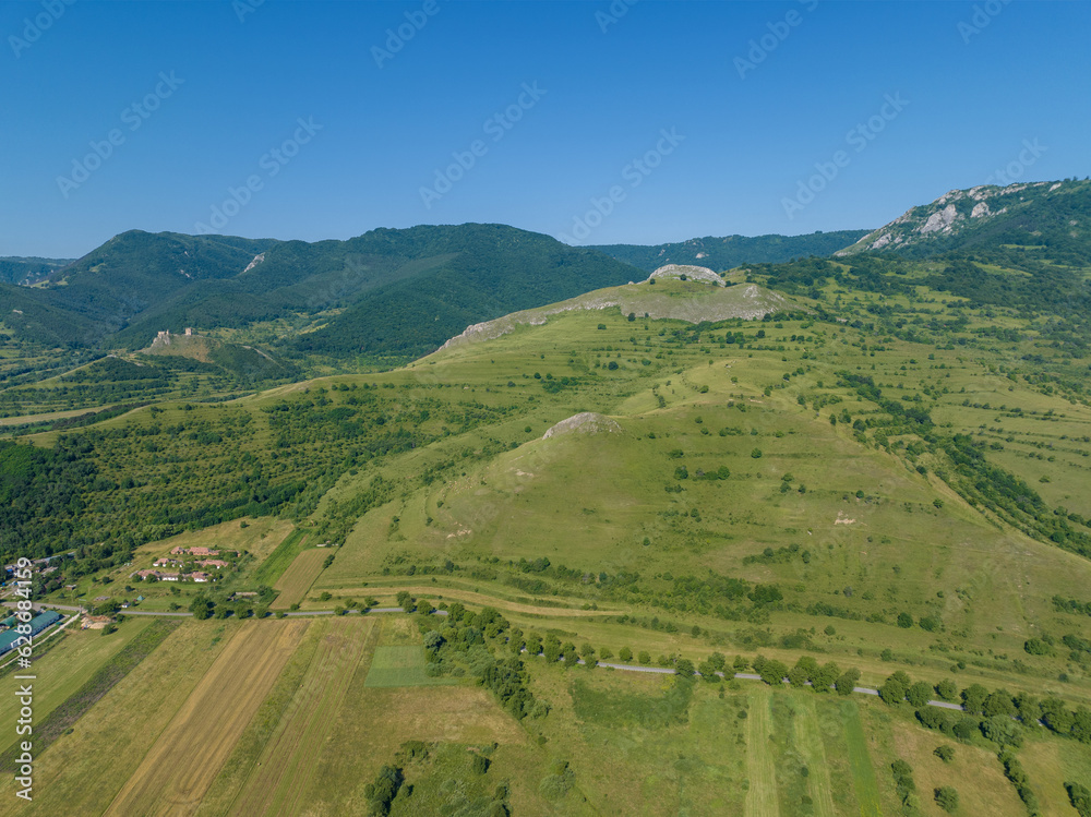 Romania - Transylvania - Trascau fortress (in hungarian: Torockószentgyörgyi vár) apuseni mountains from drone view