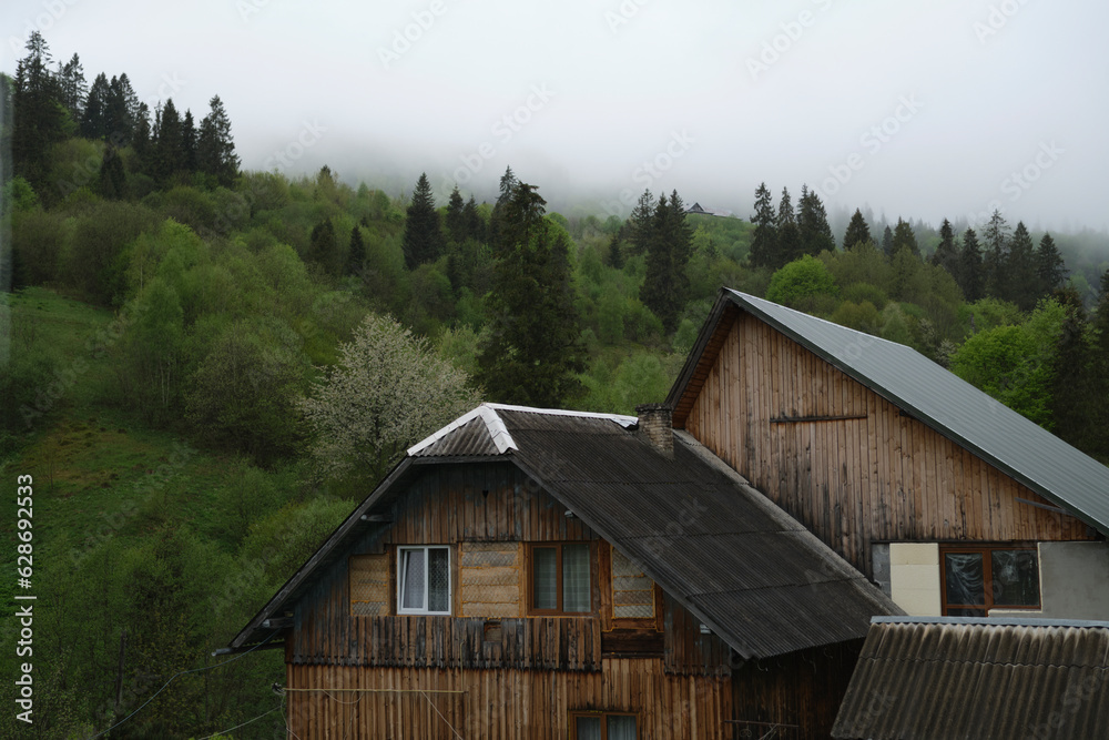 A wooden house in the mountains, with a wonderful view A wooden house in the mountains, with a wonderful view