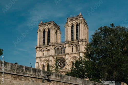 Paris, France. April 22, 2022: Notre Dame Cathedral with blue sky in the city.