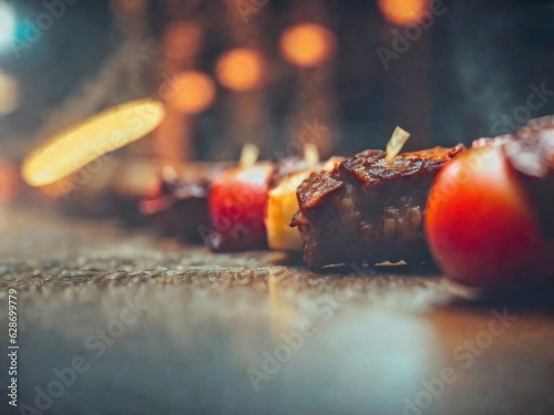 Street food, fried meat with tomatoes. foggy night wet street, shallow depth of field, blurred background. Generative AI Cheese