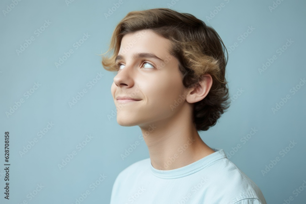 Portrait of a fictional young white man isolated on a light blue background. Generative AI. Portrait of a fictional young white man isolated on a light blue background. Generative AI.