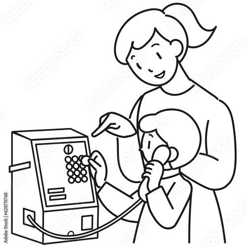 公衆電話の使い方を教える女性とかけるを練習する男の子