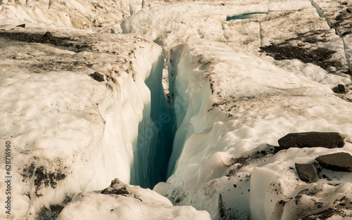 Flying by helicopter to the glacier and then Heli hiking on the glacier floor high up in the Southern alps mountain peaks on Fox Glacier photo