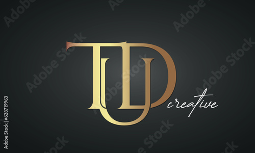 luxury letters TUD golden logo icon premium monogram, creative royal logo design photo