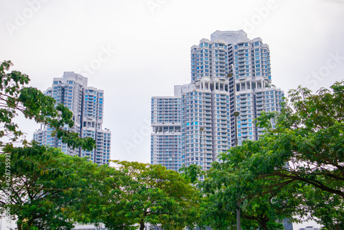 Apartment building in Malaysia with green trees