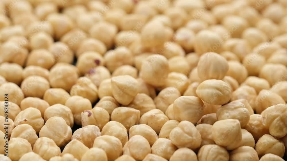 Whole shelled hazelnuts nuts kernels falling close-up Whole shelled hazelnuts nuts kernels falling close-up