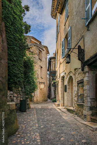 Traditional old stone houses on a street in the medieval town of Saint Paul de Vence  French Riviera  South of France