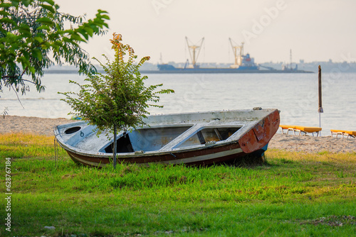 abandoned fisherman boat on beach