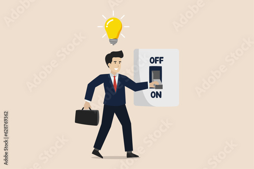 Idea to solve company problem or innovation, smart businessman flips a light bulb switch to light up an idea.
