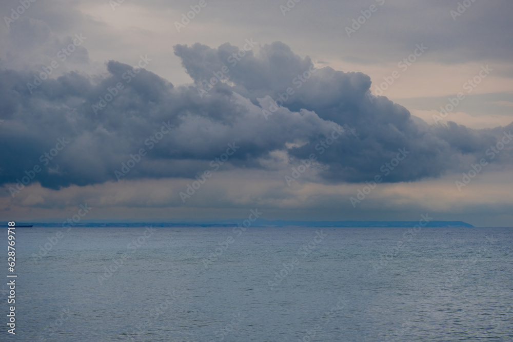 Fototapeta premium Beautiful view of sea with stormy clouds