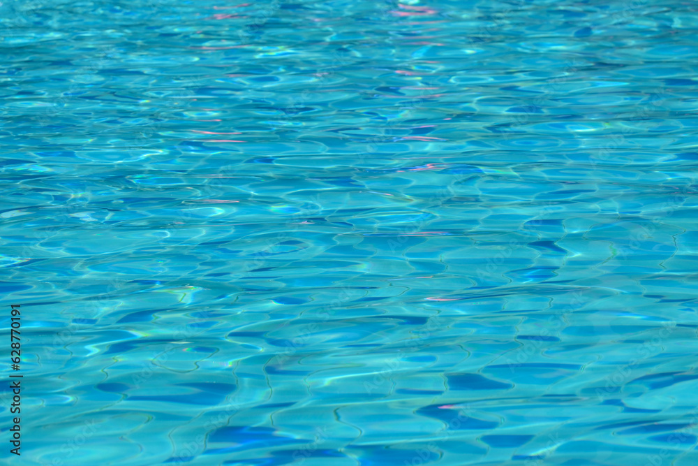 surface of blue swimming pool, freshness water background surface of blue swimming pool, freshness water background