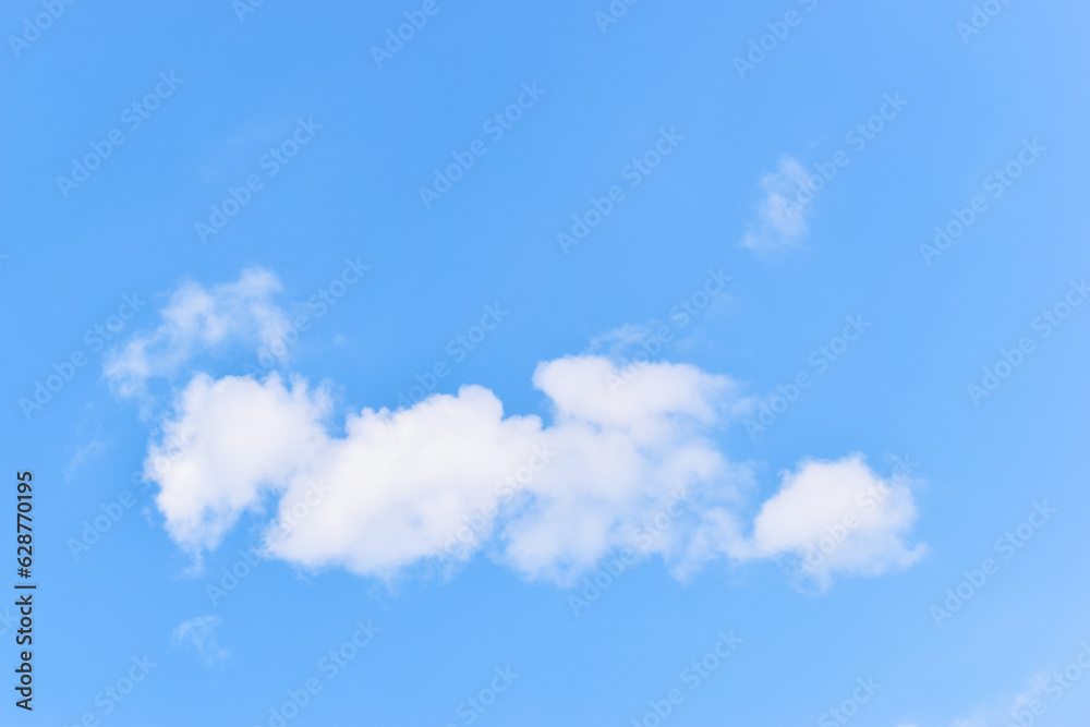 beautiful blue sky and white fluffy group of clouds with sunrise in the morning, natural background beautiful blue sky and white fluffy group of clouds with sunrise in the morning, natural background