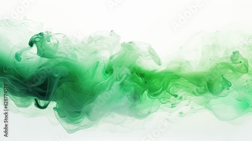 Green watercolor paints mixed in water on white background.