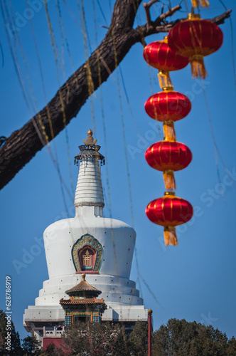 The Bai Ta - White Pagoda stupa in Beihai Park, Beijing, China photo