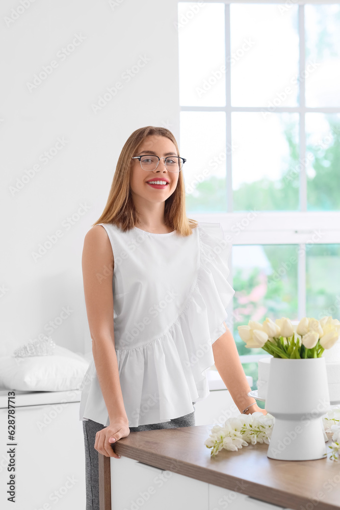 Female wedding planner working with flowers in office Female wedding planner working with flowers in office