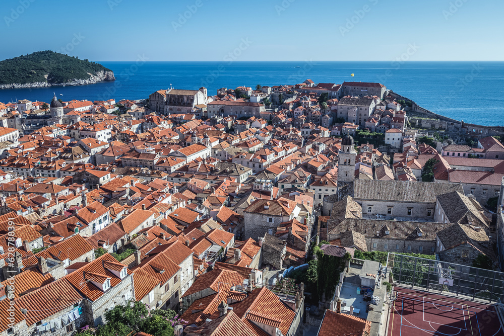 Aerial view from walls in Old Town of Dubrovnik city, Lokrum island on background, Croatia
