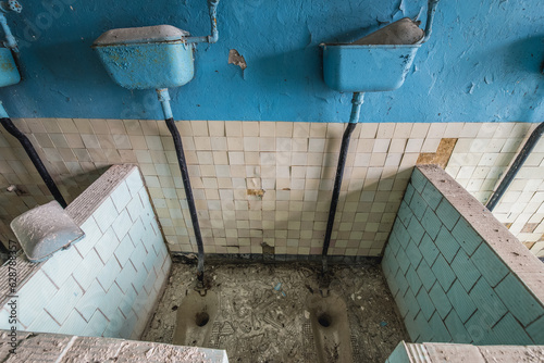 Toilets in abandoned Chernobyl-2 military base in Chernobyl Exclusion Zone, Ukraine