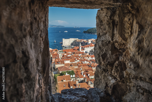 Aerial view from walls in Old Town of Dubrovnik city with Saint John Fortress and bell tower, Croatia