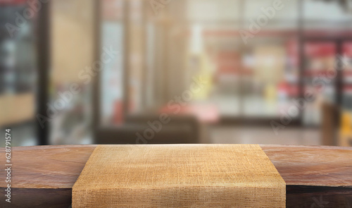 Empty wooden table isolated on Soft blurry background, of free space for your copy and branding. Use as products display montage. Vintage style concept.