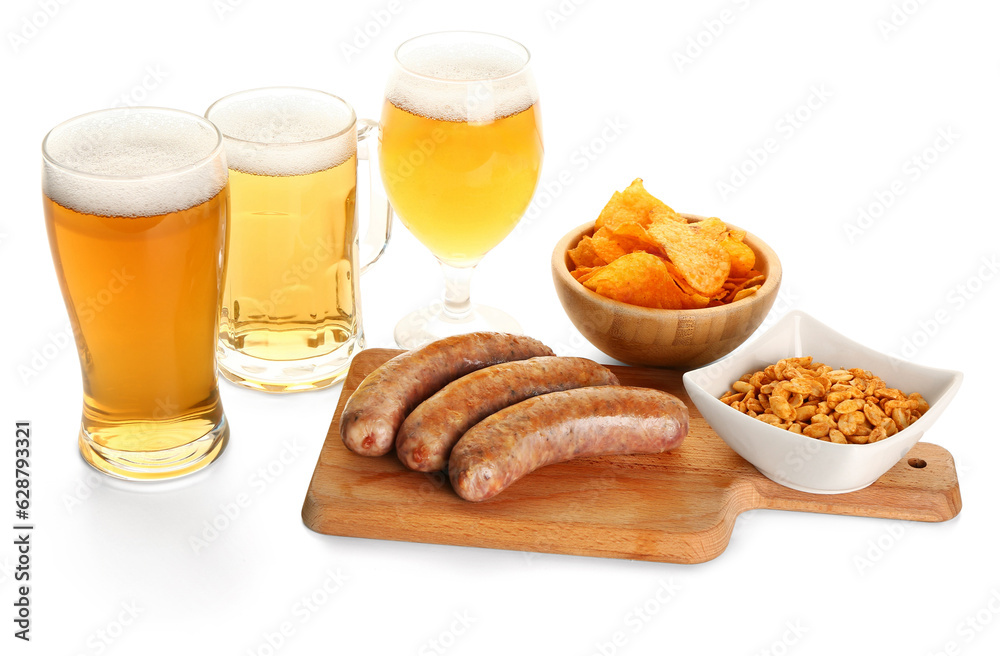 Glasses and mug of cold beer with different snacks on white background. Oktoberfest celebration Glasses and mug of cold beer with different snacks on white background. Oktoberfest celebration