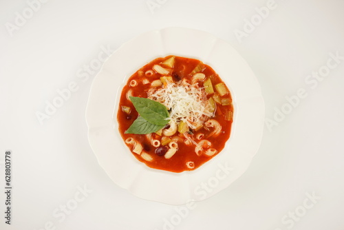 A bowl of minestrone soup with mix of vegetables. Italian cuisine