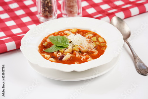 A bowl of minestrone soup with mix of vegetables. Italian cuisine