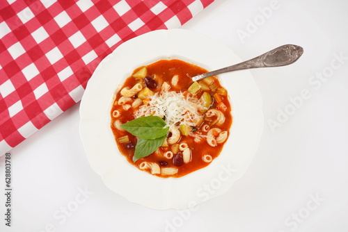 A bowl of minestrone soup with mix of vegetables. Italian cuisine