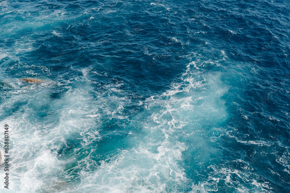  Waves on the sea. View from above on Ligurian Sea in Portofino. 