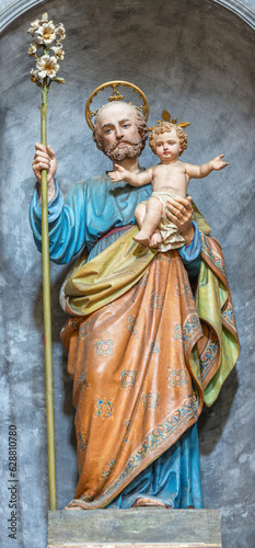 VARALLO, ITALY - JULY 17, 2022: The statue of St. Joseph in the church Basilica del Sacro Monte by Giuseppe Antonini from 19. cent.