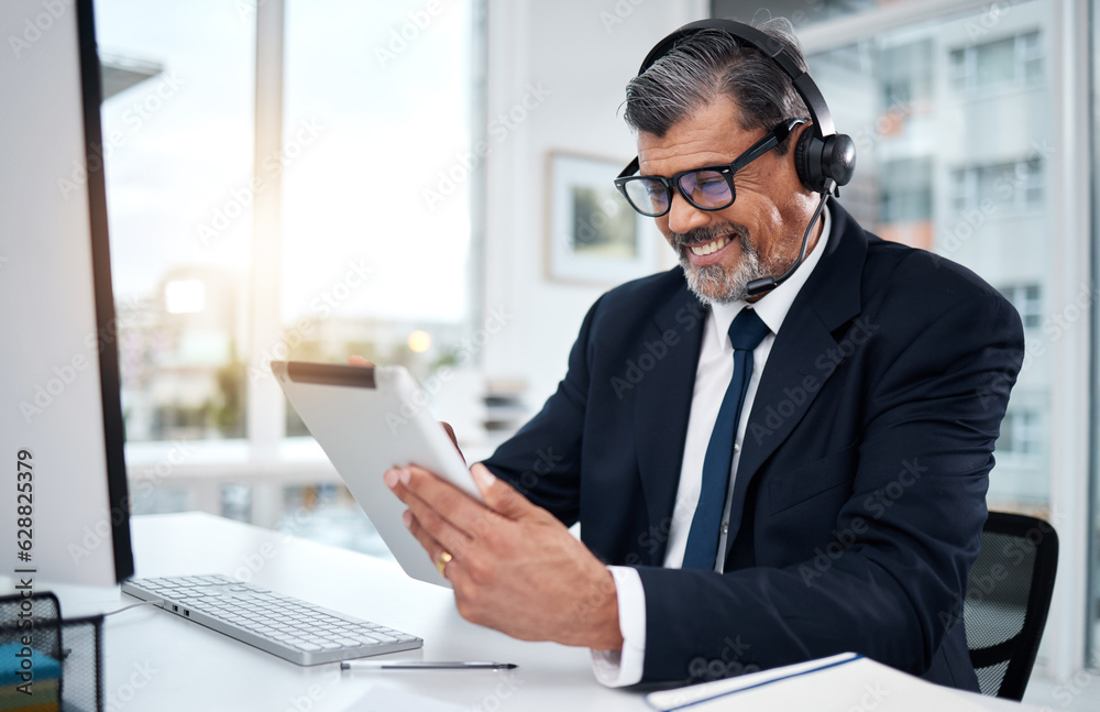 Tablet, call center and mature man in office for customer service, support and crm email. Smile, technology and professional, sales agent or consultant on internet for telemarketing research at desk Tablet, call center and mature man in office for customer service, support and crm email. Smile, technology and professional, sales agent or consultant on internet for telemarketing research at desk
