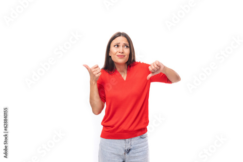 young pretty caucasian brunette in a red short sleeve shirt shows like and dislike