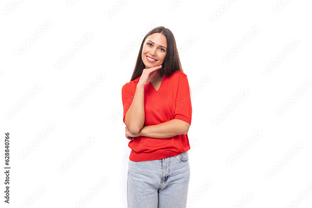 A 30-year-old smiling Caucasian woman with straight dark hair is wearing a red short-sleeve shirt A 30-year-old smiling Caucasian woman with straight dark hair is wearing a red short-sleeve shirt
