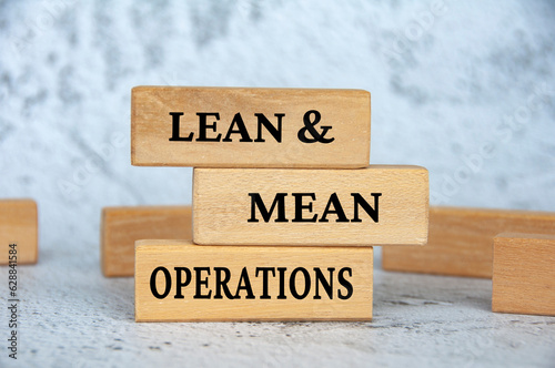 Φωτογραφία Lean and mean operations text on wooden blocks