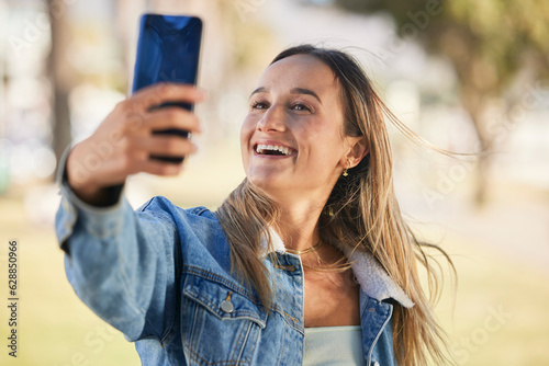 Happiness, nature park selfie and woman pose for memory profile picture, post to social network and smile for holiday photo. Vacation, outdoor photography and gen z person update online media app