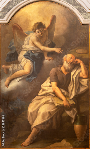 NAPLES, ITALY - APRIL 20, 2023: The painting Prophet Elijah Receiving Bread and Water from an Angel in church Basilica santuario di Santa Maria del Carmine Maggiore by Giovanni Sarnelli (1714 – 1793)
