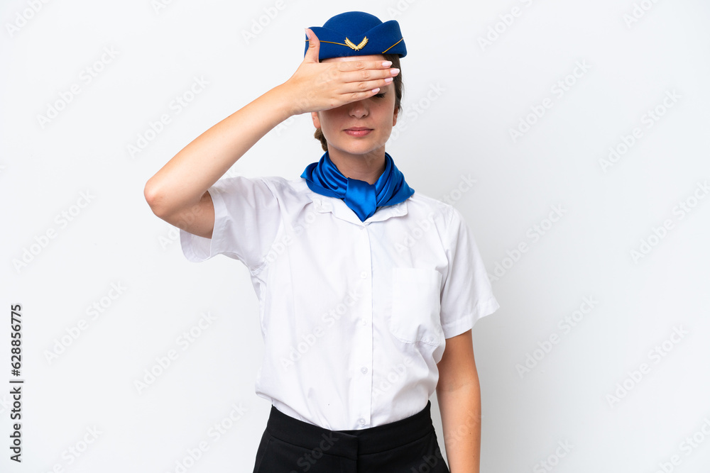 Airplane stewardess caucasian woman isolated on white background covering eyes by hands. Do not want to see something