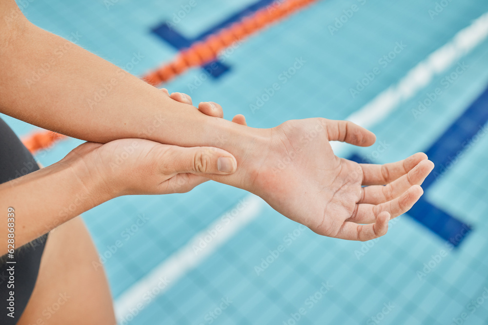 Hand, wrist pain and a swimmer by a pool in the gym closeup after