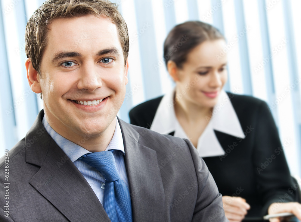 Portrait of happy smiling cheerful business man at office Portrait of happy smiling cheerful business man at office