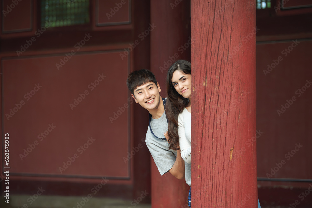 a couple traveling to famous tourist attractions in Korea a couple traveling to famous tourist attractions in Korea