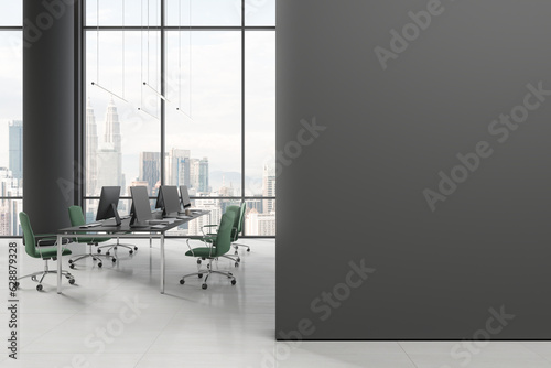 Gray open space office interior with blank wall
