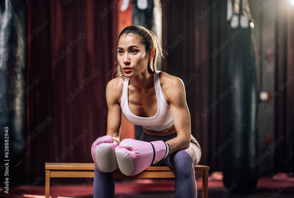 Fototapeta premium Kickboxing enthusiasts build strength, endurance, discipline, punch with power, movement, smash bags