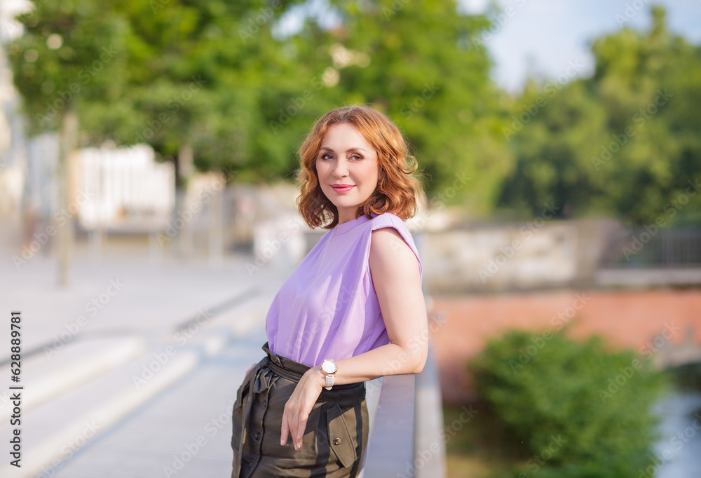 © Igor Borodin - Beautiful successful middle aged woman posing on the street photo shoot © Igor Borodin - Beautiful successful middle aged woman posing on the street photo shoot