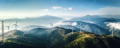 Foto Wind turbines generating green power high in mountains